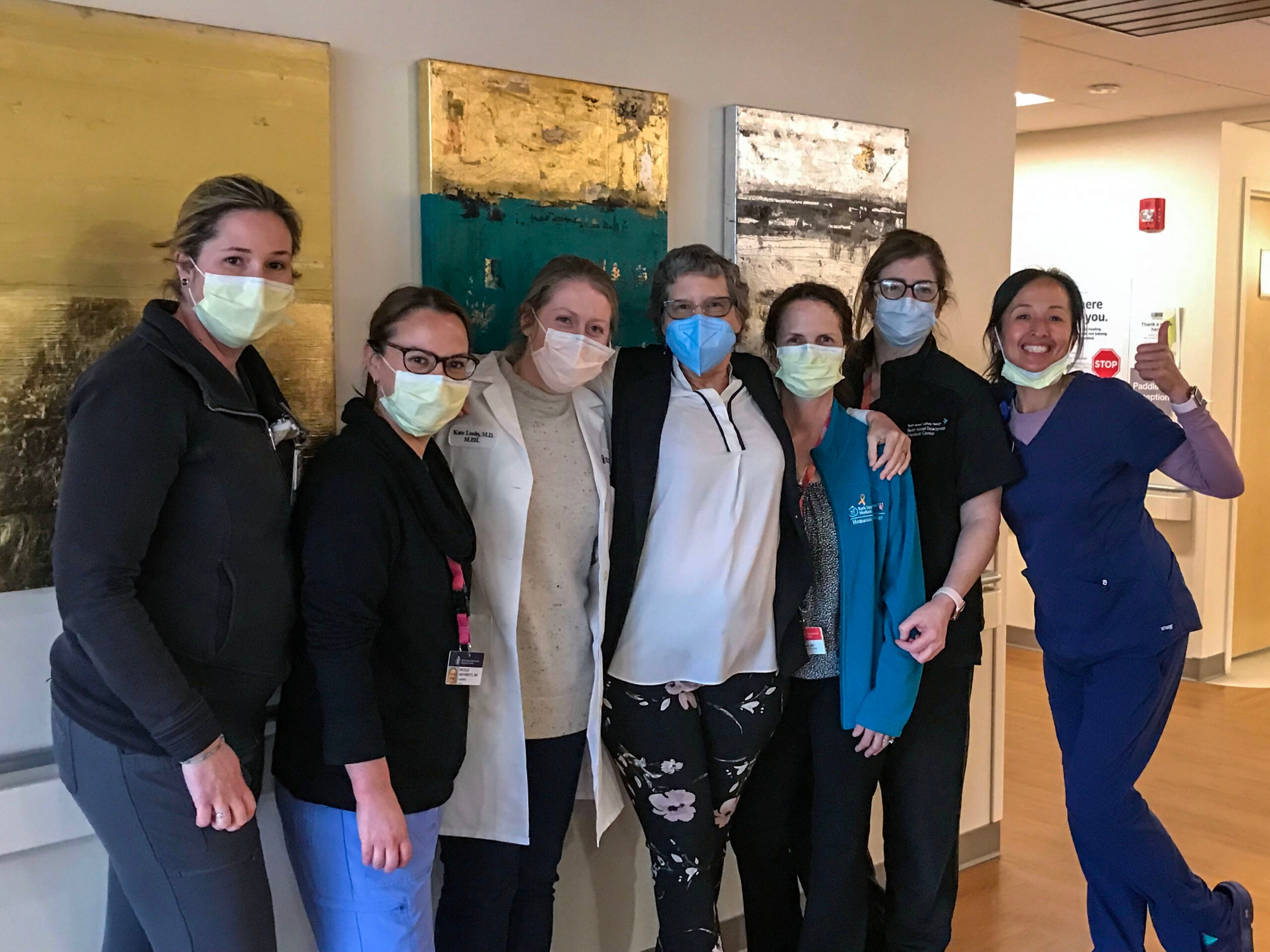 Bobbie Collins with oncology care staffers at hospital.